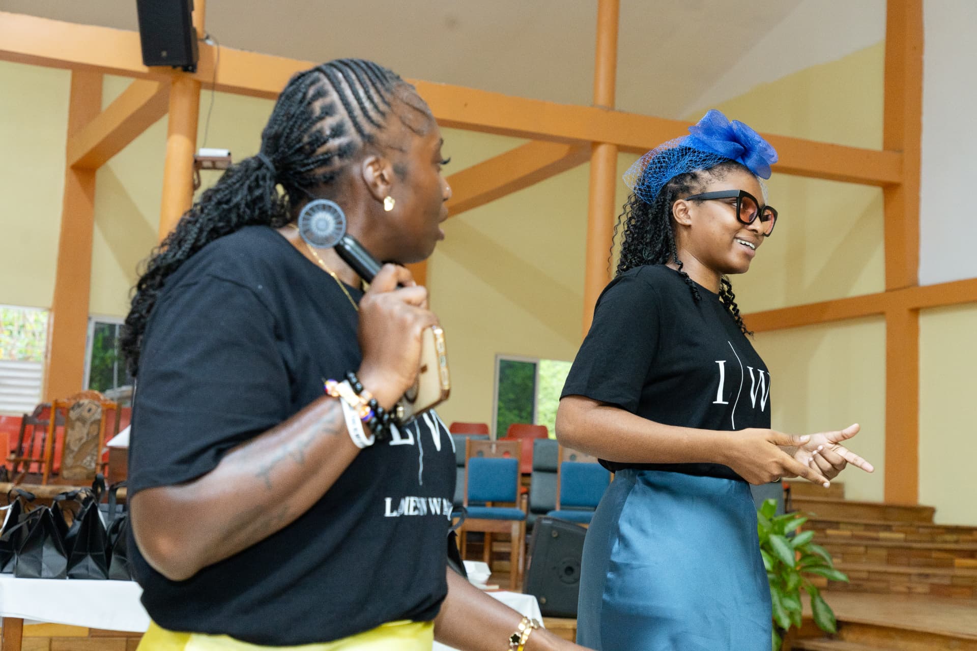 Two LIW Jamaica hosts leading the session, with gift bags ready in the background